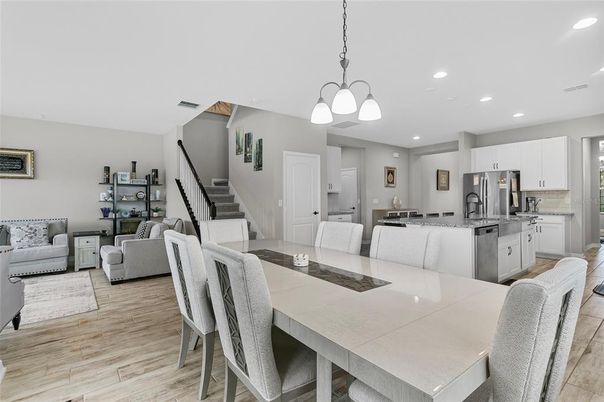 Dining room, Interior, Kitchen, Living room, Pendant Lights, Recessed Lighting, Stainless Steel Appliances, Wood Texture Flooring