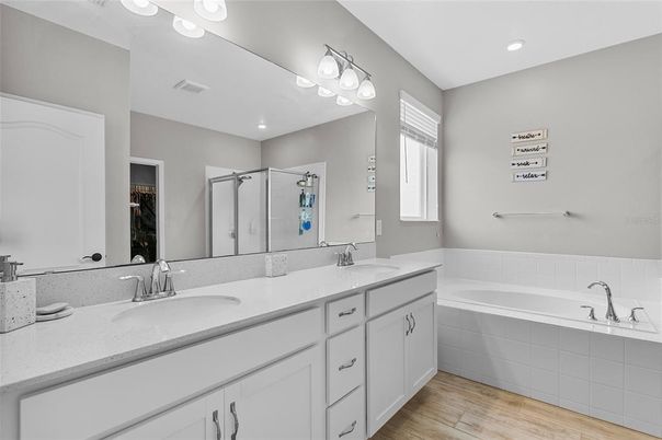 Bathroom, Dual Sink Vanities, Interior, Recessed Lighting, Wood Texture Flooring