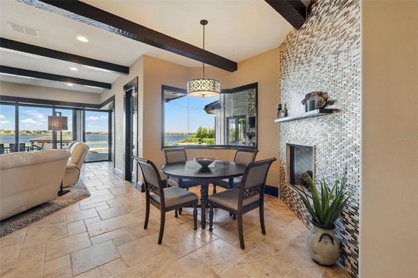 Dining room, Fireplace, Interior, Living room, Pendant Lights, Recessed Lighting, Water, Wooden Beams