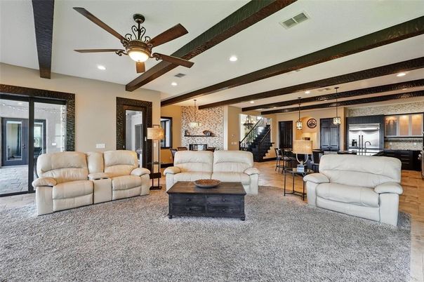 Dining room, Interior, Kitchen, Living room, Pendant Lights, Recessed Lighting, Stainless Steel Appliances, Wooden Beams, Wood Texture Flooring