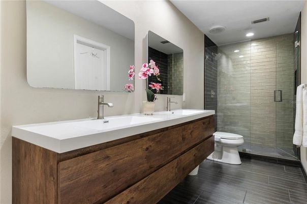 Bathroom, Dual Sink Vanities, Glass Shower, Interior, Recessed Lighting, Wood Texture Flooring
