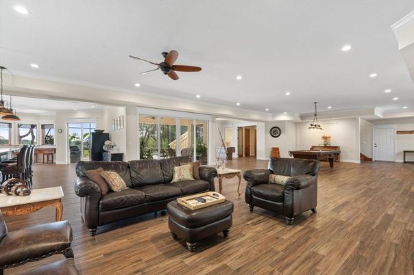 Billiard Table, Game Room, Interior, Living room, Pendant Lights, Recessed Lighting, Wood Texture Flooring