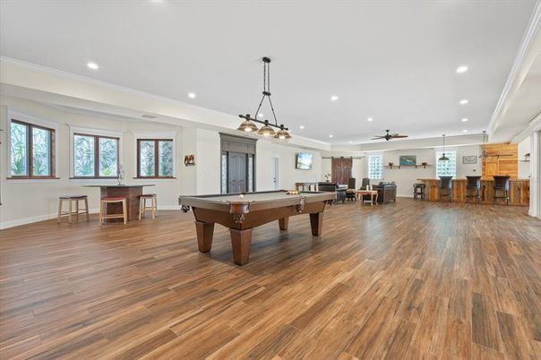 Billiard Table, Chandelier, Game Room, Interior, Pendant Lights, Recessed Lighting, Wood Texture Flooring