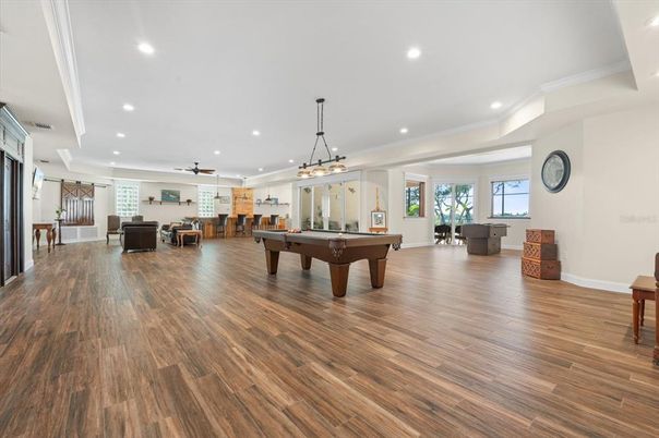 Billiard Table, Chandelier, Game Room, Interior, Pendant Lights, Recessed Lighting, Wood Texture Flooring