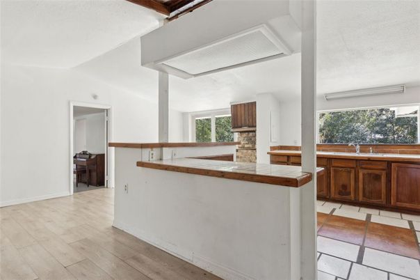 Interior, Kitchen, Tile Countertops, Wood Texture Flooring