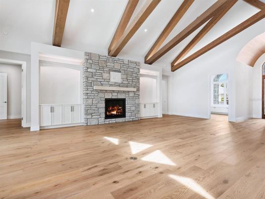 Empty room, Fireplace, Interior, Recessed Lighting, Wooden Beams, Wood Texture Flooring