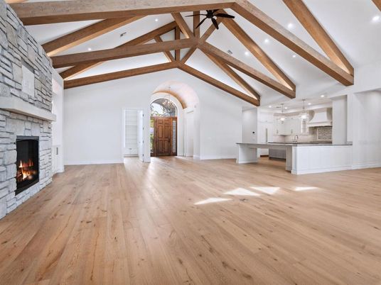 Empty room, Fireplace, Interior, Kitchen, Pendant Lights, Recessed Lighting, Wooden Beams, Wood Texture Flooring