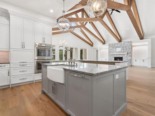 Fireplace, Interior, Kitchen, Pendant Lights, Recessed Lighting, Stainless Steel Appliances, Wooden Beams, Wood Texture Flooring