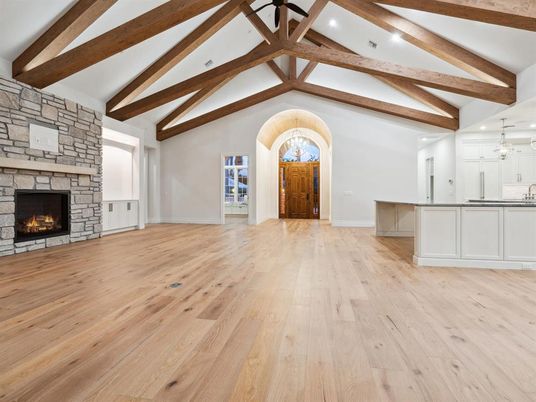 Chandelier, Empty room, Fireplace, Interior, Kitchen, Pendant Lights, Recessed Lighting, Wooden Beams, Wood Texture Flooring