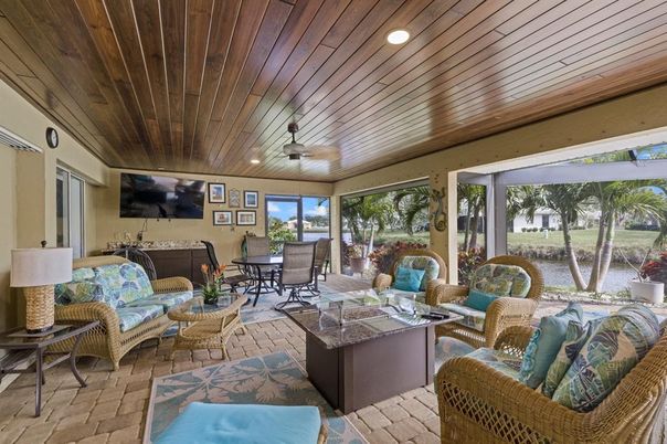 Dining room, Interior, Living room, Recessed Lighting, Sun Room, Water, Wooden Ceilings