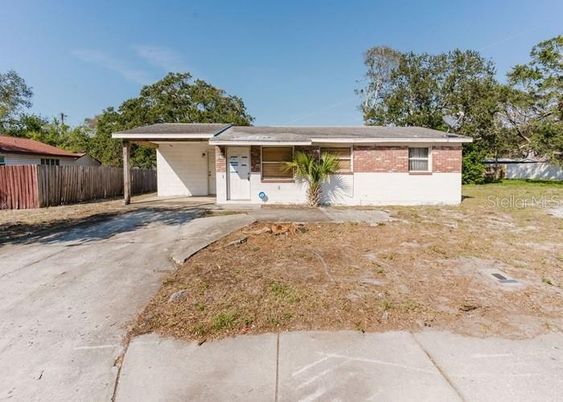 Attached, Backyard, Exterior, Facade, Brick Facade, Ranch