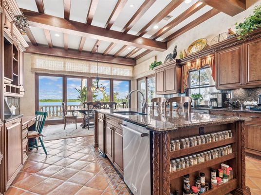 Dining room, Interior, Kitchen, Pendant Lights, Recessed Lighting, Stainless Steel Appliances, Water, Wooden Beams