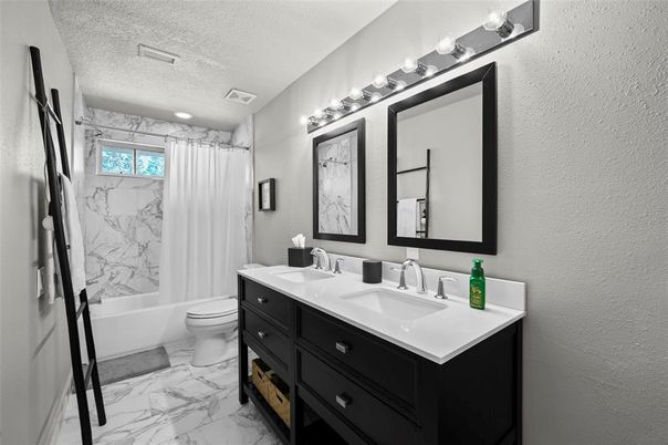 Bathroom, Dual Sink Vanities, Interior, Marble, Marble Walls, Recessed Lighting