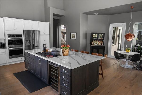 Dining room, Interior, Kitchen, Pendant Lights, Stainless Steel Appliances, Wood Texture Flooring