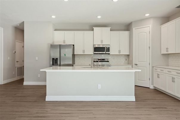 Interior, Kitchen, Recessed Lighting, Stainless Steel Appliances, Wood Texture Flooring