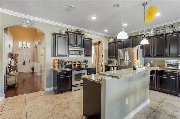 Interior, Kitchen, Pendant Lights, Recessed Lighting, Stainless Steel Appliances, Wood Texture Flooring