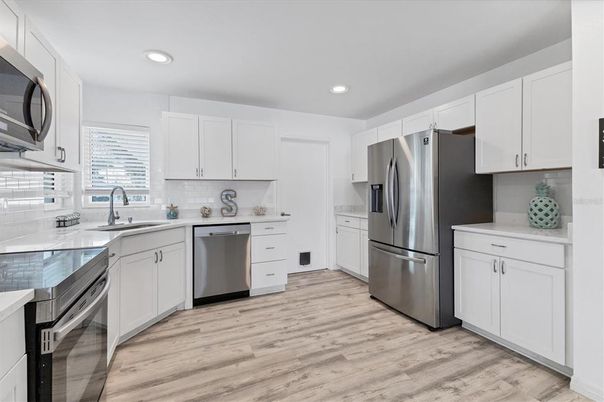 Interior, Kitchen, Recessed Lighting, Stainless Steel Appliances, Wood Texture Flooring