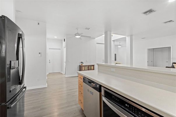 Interior, Kitchen, Recessed Lighting, Stainless Steel Appliances, Wood Texture Flooring