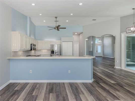 Interior, Kitchen, Pendant Lights, Recessed Lighting, Stainless Steel Appliances, Wood Texture Flooring