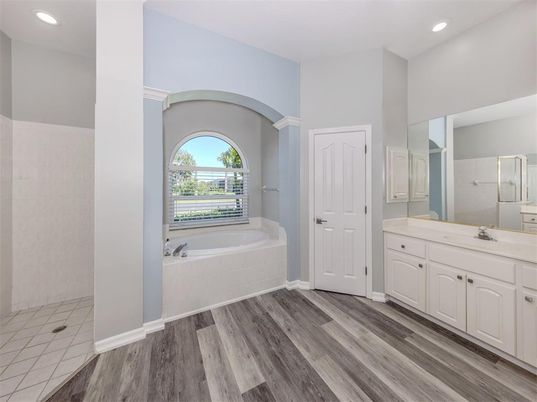Bathroom, Dual Sink Vanities, Interior, Recessed Lighting, Wood Texture Flooring