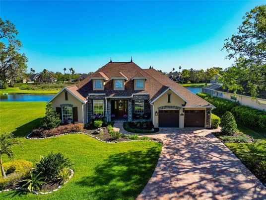 Attached, Backyard, Exterior, Facade, Brick Facade, Water, French Provincial