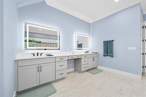 Bathroom, Dual Sink Vanities, Interior, Recessed Lighting, Wood Texture Flooring