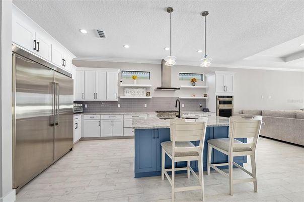 Interior, Kitchen, Marble, Pendant Lights, Recessed Lighting, Stainless Steel Appliances, Wood Texture Flooring