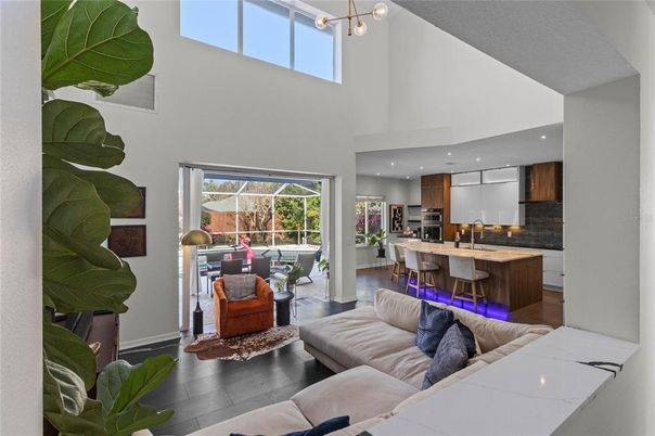 Dining room, Interior, Kitchen, Living room, Pendant Lights, Recessed Lighting, Stainless Steel Appliances, Wood Texture Flooring
