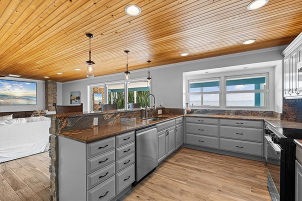 Interior, Kitchen, Living room, Pendant Lights, Recessed Lighting, Stainless Steel Appliances, Wooden Ceilings, Wood Texture Flooring