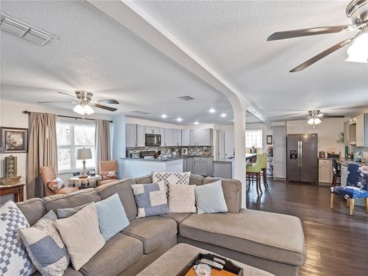 Dining room, Interior, Kitchen, Living room, Recessed Lighting, Stainless Steel Appliances, Wood Texture Flooring