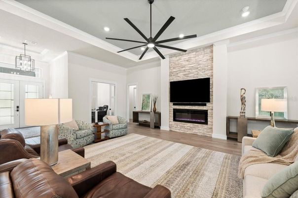Fireplace, Interior, Living room, Pendant Lights, Recessed Lighting, Stone Walls, Wood Texture Flooring