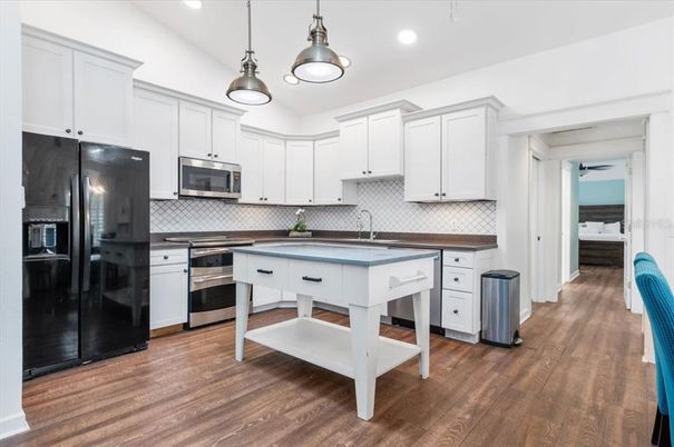 Interior, Kitchen, Pendant Lights, Recessed Lighting, Stainless Steel Appliances, Wood Texture Flooring