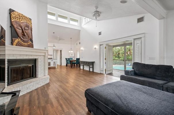 Dining room, Fireplace, Interior, Pendant Lights, Wood Texture Flooring