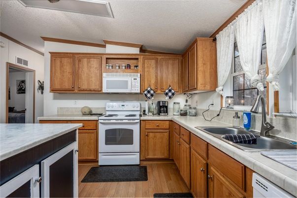 Interior, Kitchen, Tile Countertops, Wood Texture Flooring