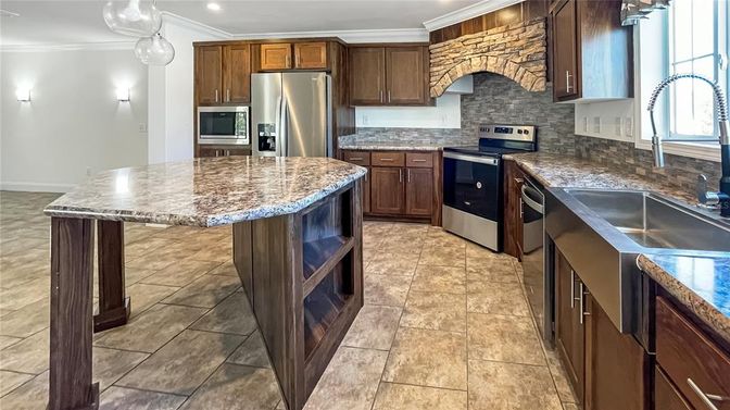 Interior, Kitchen, Recessed Lighting, Stainless Steel Appliances, Stone Walls