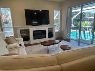 Fireplace, Interior, Living room, Recessed Lighting, Wood Texture Flooring
