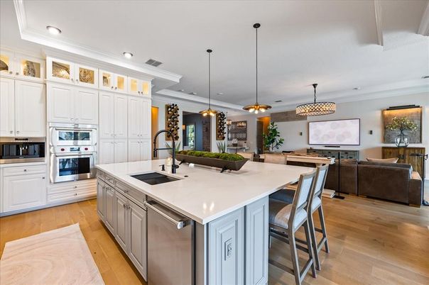 Dining room, Interior, Kitchen, Living room, Pendant Lights, Recessed Lighting, Stainless Steel Appliances, Wood Texture Flooring