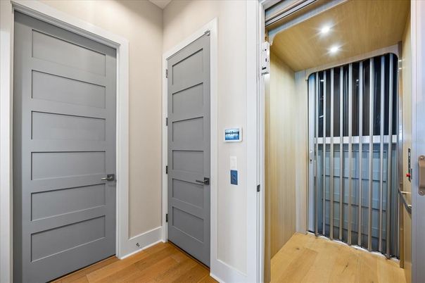 Elevator, Interior, Recessed Lighting, Wood Texture Flooring, Wooden Walls