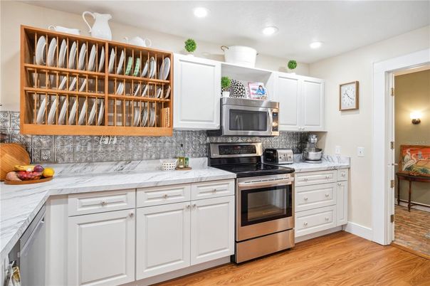 Interior, Kitchen, Recessed Lighting, Stainless Steel Appliances, Wood Texture Flooring