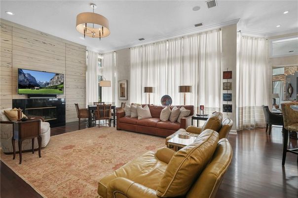 Dining room, Fireplace, Interior, Living room, Pendant Lights, Recessed Lighting, Wood Texture Flooring, Wooden Walls