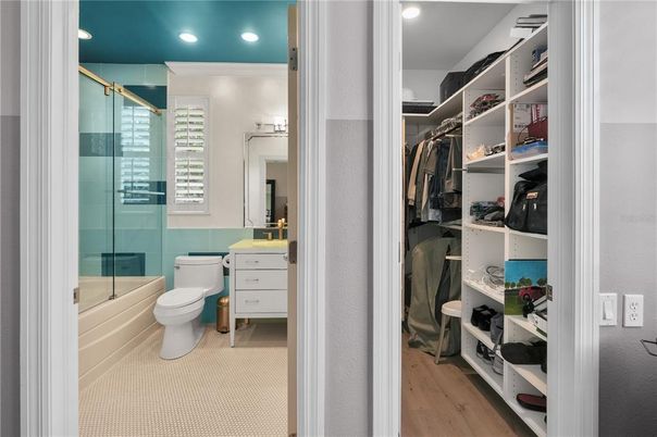 Bathroom, Glass Shower, Interior, Recessed Lighting, Walk-in Closets, Wood Texture Flooring
