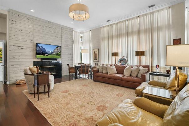 Chandelier, Dining room, Fireplace, Interior, Living room, Recessed Lighting, Wood Texture Flooring