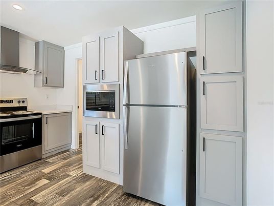 Interior, Kitchen, Recessed Lighting, Stainless Steel Appliances, Wood Texture Flooring