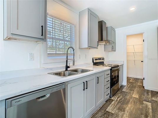 Interior, Kitchen, Recessed Lighting, Stainless Steel Appliances, Wood Texture Flooring
