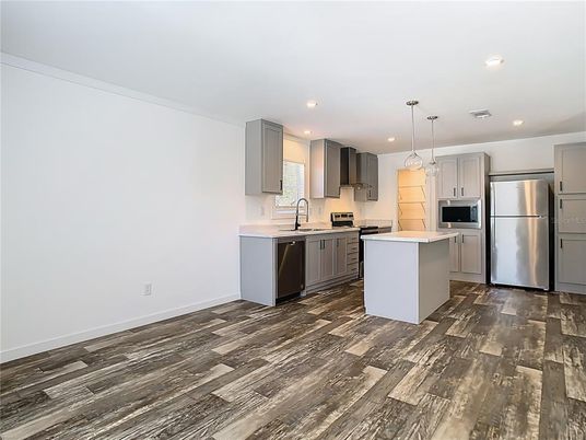 Interior, Kitchen, Pendant Lights, Recessed Lighting, Stainless Steel Appliances, Wood Texture Flooring