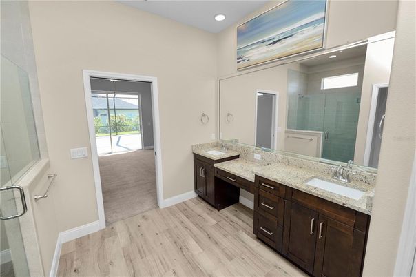 Bathroom, Dual Sink Vanities, Interior, Recessed Lighting, Wood Texture Flooring
