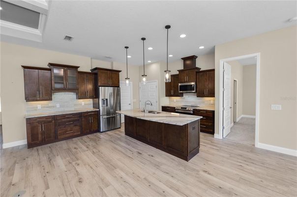 Interior, Kitchen, Pendant Lights, Recessed Lighting, Stainless Steel Appliances, Wood Texture Flooring