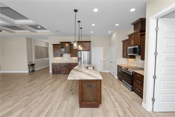 Interior, Kitchen, Pendant Lights, Recessed Lighting, Stainless Steel Appliances, Wood Texture Flooring