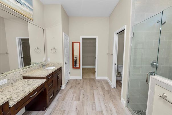 Bathroom, Dual Sink Vanities, Glass Shower, Interior, Wood Texture Flooring