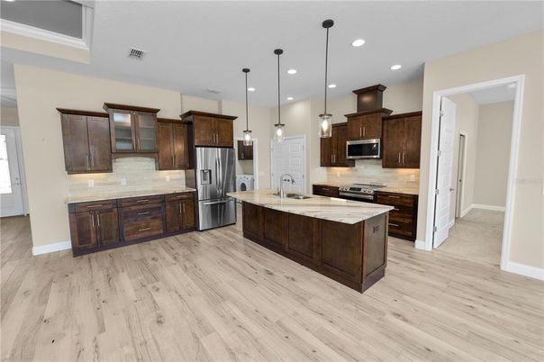 Interior, Kitchen, Pendant Lights, Recessed Lighting, Stainless Steel Appliances, Wood Texture Flooring